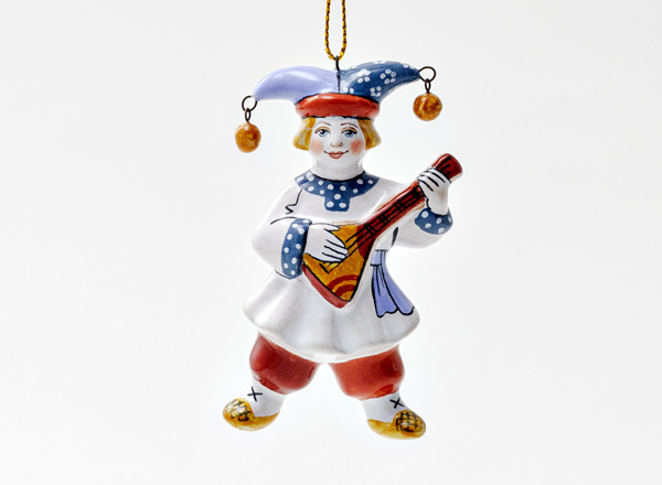 Christmas tree toy Buffoon with balalaika A buffoon with a balalaika in a white caftan