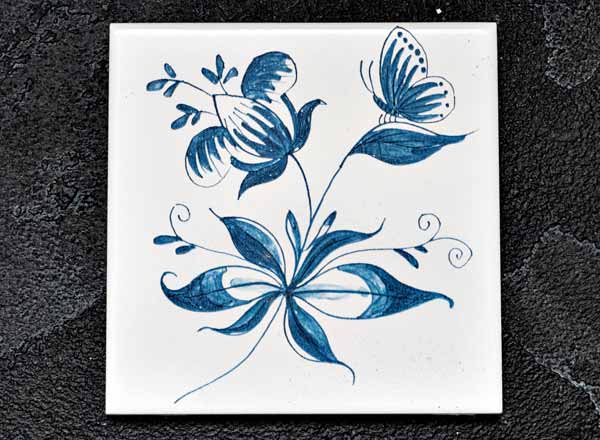 Tile rnDutch. Flower with butterfly 