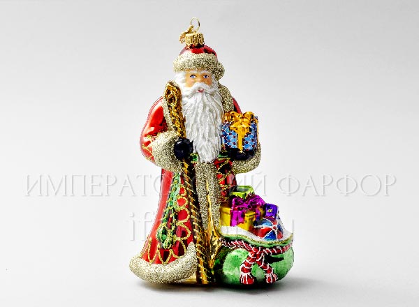 Christmas tree toy in a gift box Santa Claus with a bag of gifts