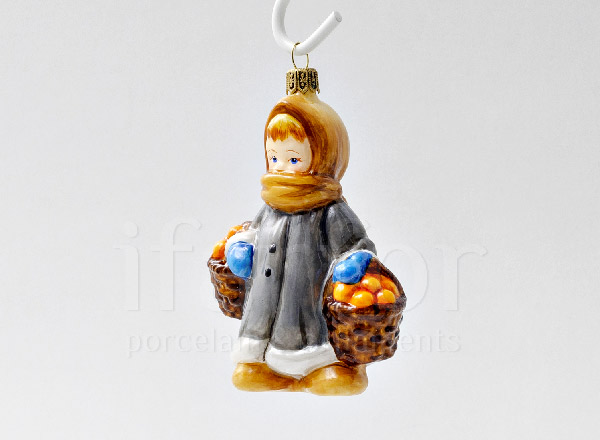 Christmas tree toy Girl with oranges