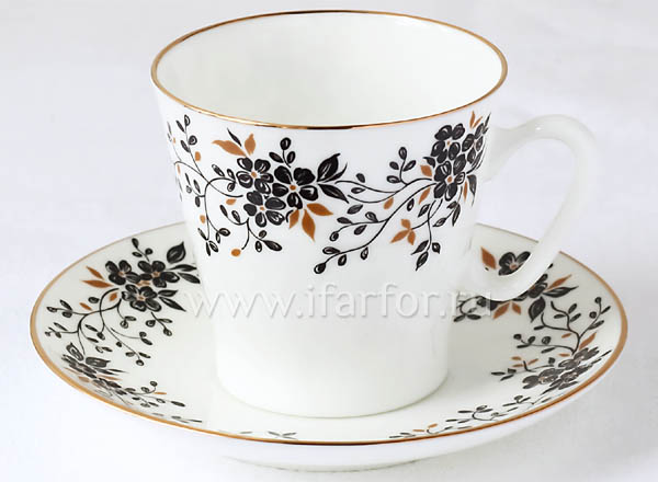 Cup and saucer Thin branches Black coffee