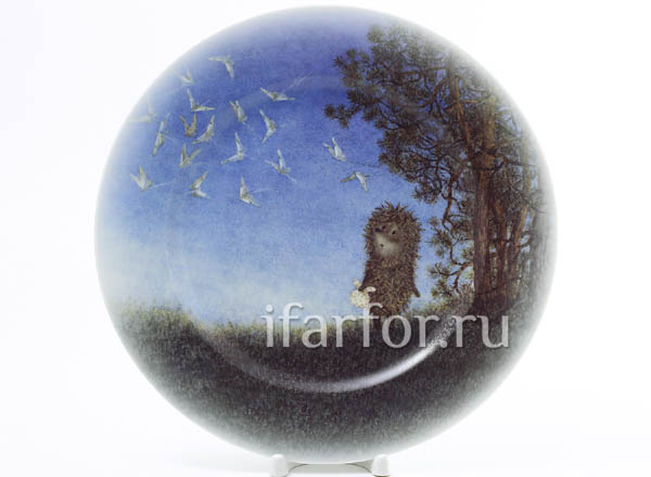 Decorative plate in a gift box Hedgehog in the fog. Hedgehog and fireflies