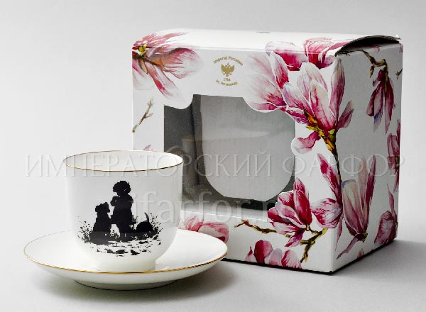 Cup and saucer in a gift box Flowers Silhouettes. Friends Lily of the valley