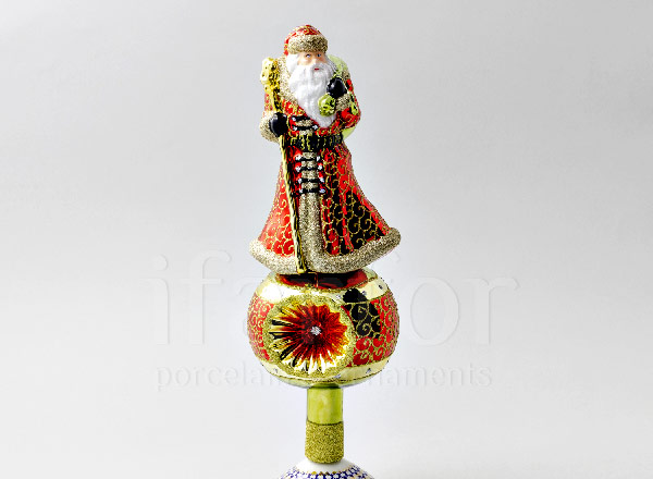 Christmas tree toy in a gift box Christmas tree top Santa Claus